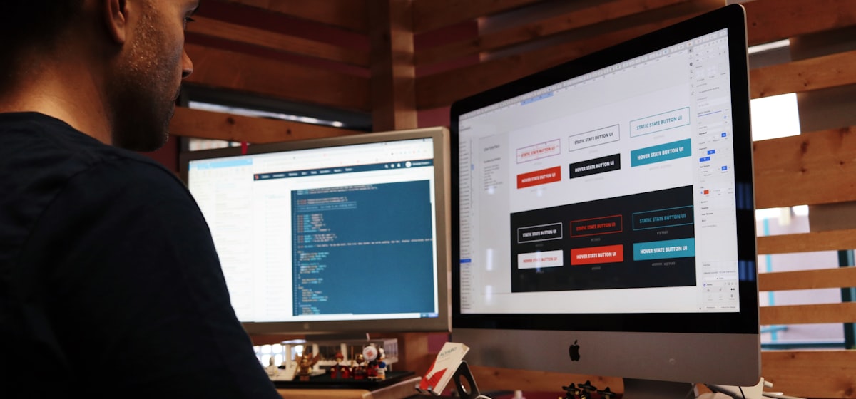 Creative media studio with multi-screen digital design workstations — Digital Pathway